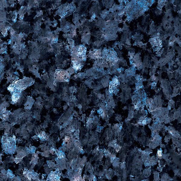 Close-up of dark granite with iridescent blue crystal patches