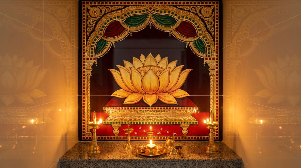 Concept: pooja room mural of printed tiles with a golden lotus